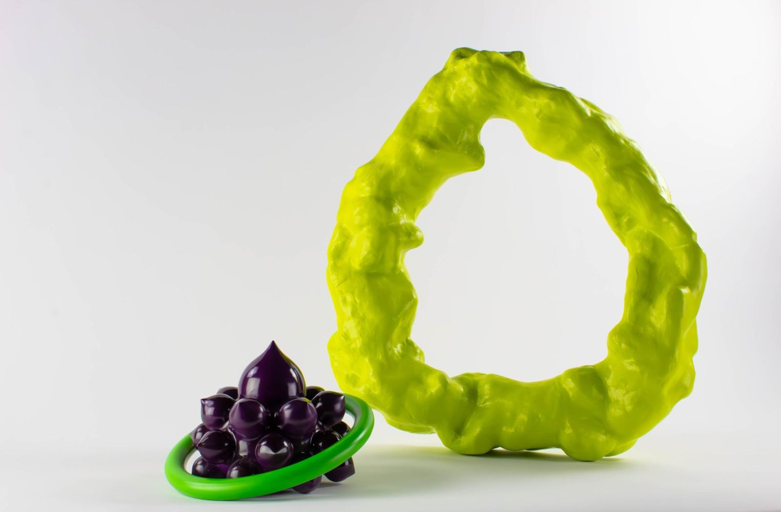 Chartreuse porcelain arch framing a purple cluster in a green ring